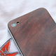 Illustration for article titled Wooden iPhone 4 Backs: Tackily Awesome, or Awesomely Tacky?